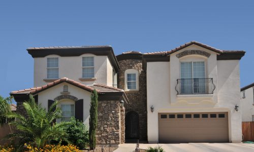 White & Brown Stucco Exterior