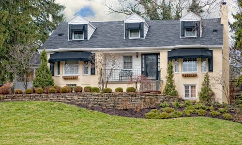 Yellow / Cream Painted Brick Exterior