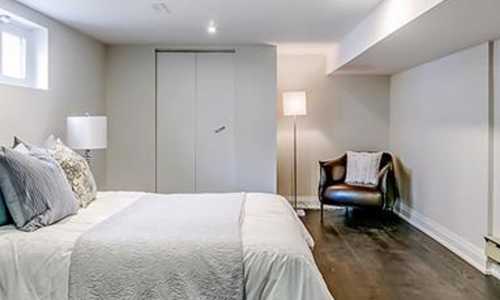 White Painted Basement Bedroom